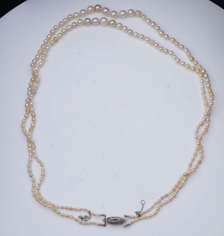 A natural pearl and diamond necklace, early 20th century